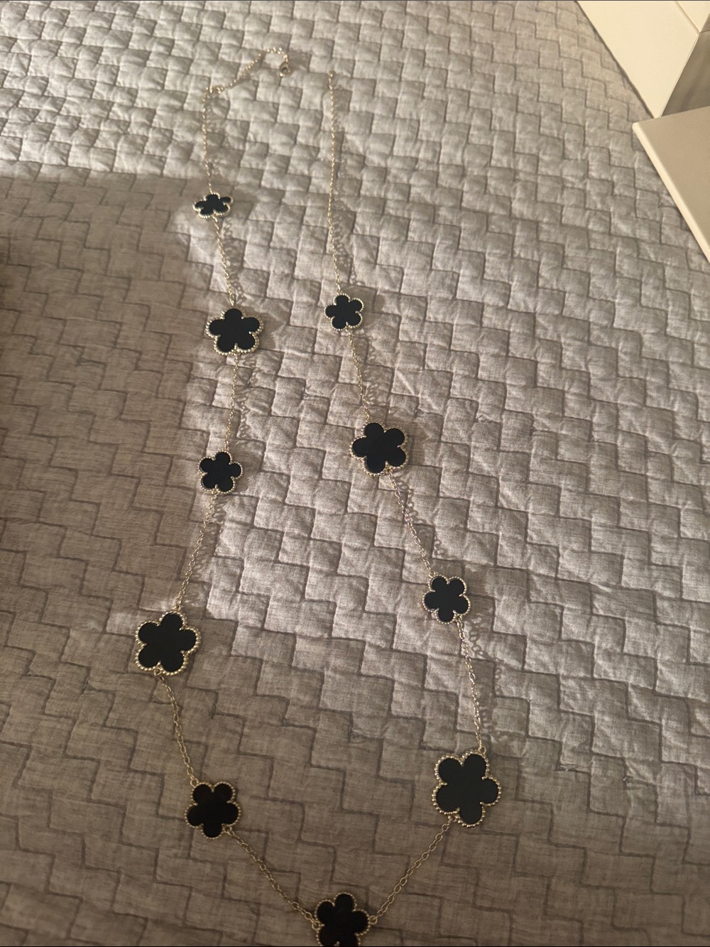 Long Black Clover Station Necklace with Gold Trim